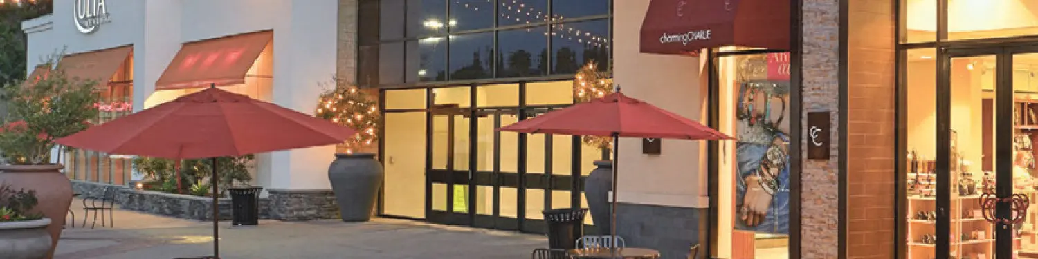 Patio dining setup near shops